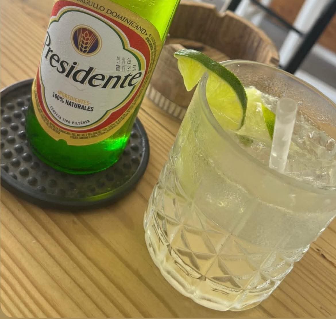 Presidente beer and a lime cocktail
