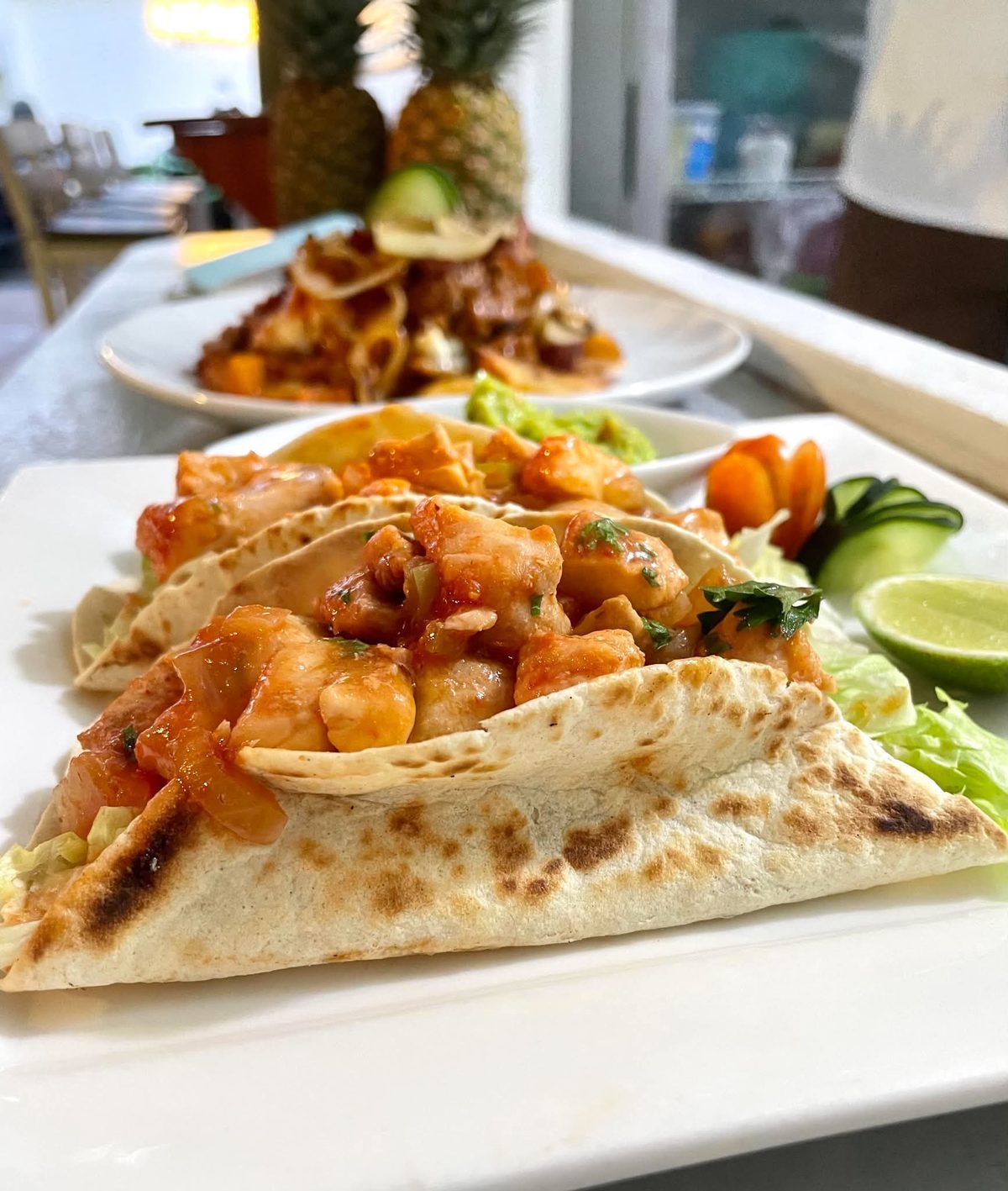 Fish tacos with guacamole and lime